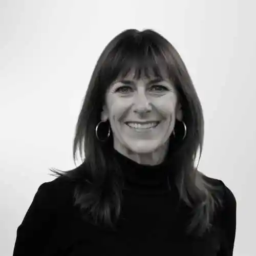 a woman with earrings and smile