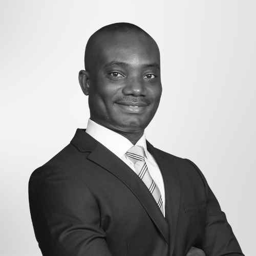 a bold man with business suit and tie