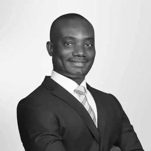 a bold man with business suit and tie